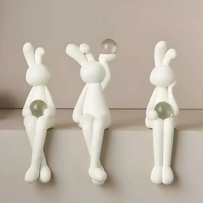 Glänzend - weißer Osterhase aus Harz mit Kristallkugel 3 cm
