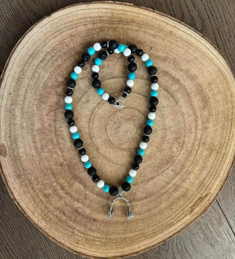 Herenketting met koptelefoon bedeltje