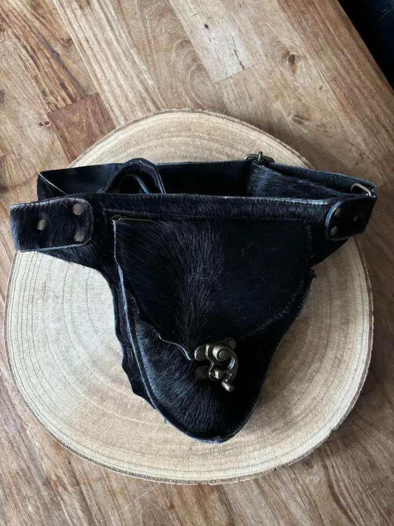 Heuptasje van zwart suede/leer