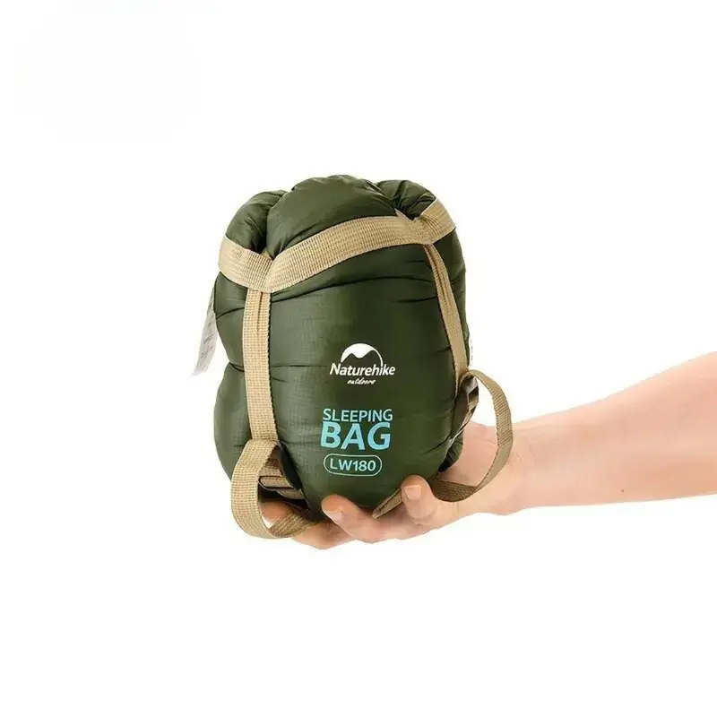 Lichte trekkingslaapzak – compressiehoes en doorlopende ritssluiting