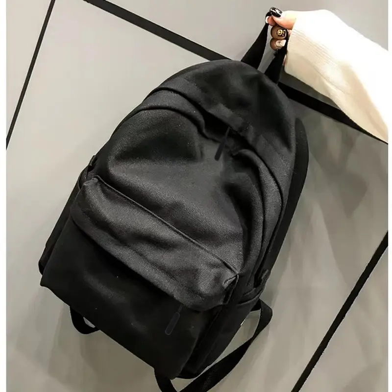 Minimalist Black Backpack - Large Main Compartment and Zippered Pocket