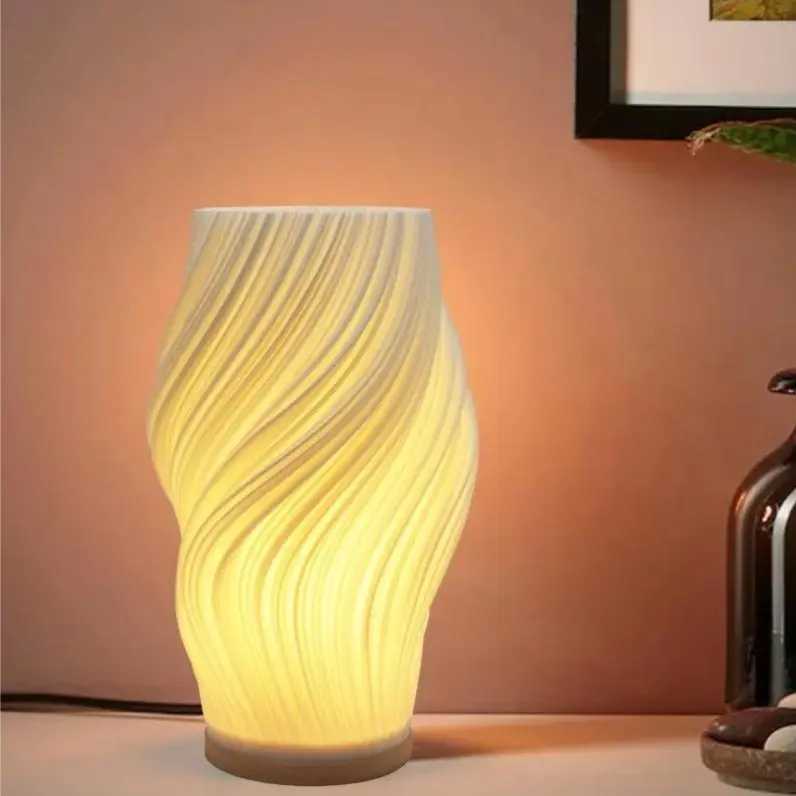 Sculptural, Dimmable LED Table Lamp with a Wave-Inspired Design