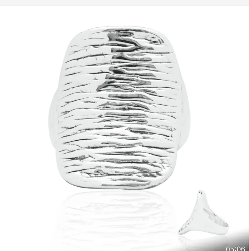 Silver wide ring with texture