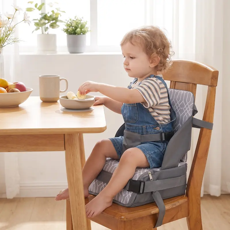 Stoelverhoger voor aan tafel – opvouwbaar, harnas en afwasbare stof